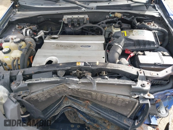 2005 Ford Escape Hybrid with VIN 1FMCU96HX5KC07148, listed as a IAAI auction lot 41741158 with 225,598 mi miles. Bid and sale history available at carsss.com. Image 10.
