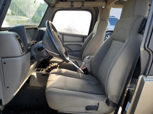 2003 Jeep Wrangler Sahara with VIN 1J4FA59S83P318057, listed as a Copart auction lot 58781495 with 102,571 mi miles and Clean title. Bid and sale history available at DreamBid. Image 7.