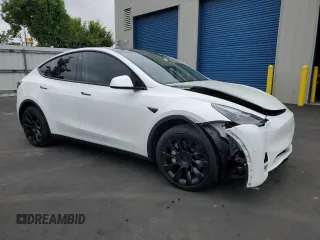 2023 Tesla Model Y Long Range with VIN 7SAYGDEEXPF744472, listed as a Copart auction lot 54109315 with 15,404 mi miles and Salvage Title. Bid and sale history available at DreamBid. Image 4.