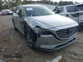 2019 Mazda CX-9 Signature with VIN JM3TCBEY1K0307203, listed as a IAAI auction lot 40863212 with 88,632 mi miles. Bid and sale history available at carsss.com. Image 1.