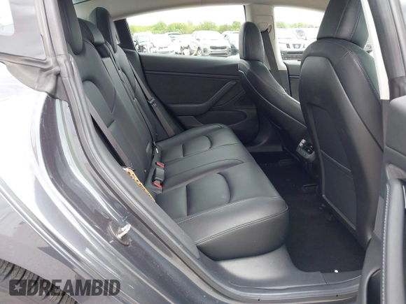 2018 Tesla Model 3 Long Range Battery with VIN 5YJ3E1EB3JF119498, listed as a IAAI auction lot 41966643 with 45,566 mi miles and . Bid and sale history available at DreamBid. Image 8.