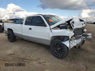 1999 Dodge Ram 2500 with VIN 3B7KC2364XG126122, listed as a Copart auction lot 80802084 with 271,918 mi miles and Salvage Title. Bid and sale history available at carsss.com. Image 4.