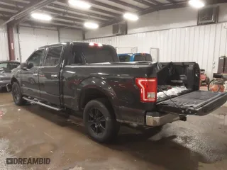 2015 Ford F-150 XLT w/HD Payload Pkg with VIN 1FTFW1EG8FFB59391, listed as a IAAI auction lot 41520010 with 119,414 mi miles. Bid and sale history available at carsss.com. Image 3.