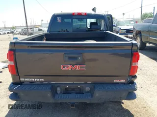 2015 GMC Sierra 1500 SLT with VIN 3GTU2VEC5FG457905, listed as a IAAI auction lot 42026975 with 160,637 mi miles and . Bid and sale history available at DreamBid. Image 17.