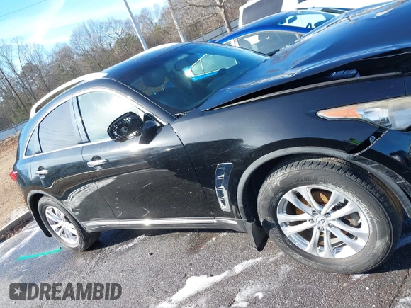 2013 Infiniti FX z VIN JN8CS1MUXDM140215, wystawiony jako IAAI lot #41271039 z przebiegiem 134 887 mil mil oraz . Historia ofert i sprzedaży dostępna na DreamBid. Obrazek 13.