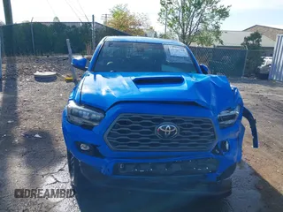 2021 Toyota Tacoma SR z VIN 3TYCZ5AN7MT008274, wystawiony jako IAAI lot #42091508 z przebiegiem 59 371 mil mil oraz . Historia ofert i sprzedaży dostępna na DreamBid. Obrazek 13.