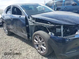2021 Mazda CX-30 Select with VIN 3MVDMBBL6MM243726, listed as a IAAI auction lot 42353943 with 67,239 mi miles and . Bid and sale history available at DreamBid. Image 6.