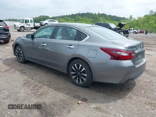 2018 Nissan Altima SR with VIN 1N4AL3AP6JC267111, listed as a IAAI auction lot 42070413 with 117,954 mi miles and . Bid and sale history available at carsss.com. Image 3.