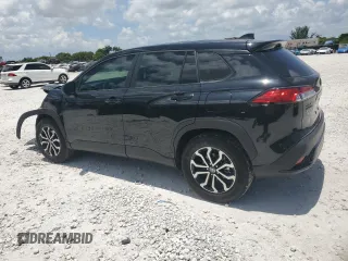 2025 Toyota Corolla Cross Hybrid S z VIN 7MUFBABG5SV077702, wystawiony jako Copart lot #60262515 z przebiegiem 5 129 mil mil oraz Szkoda całkowita • Salvage title. Historia ofert i sprzedaży dostępna na DreamBid. Obrazek 2.