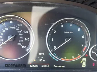 2014 BMW 5 Series 535i with VIN WBA5B1C54ED477525, listed as a IAAI auction lot 41692887 with 122,288 mi miles. Bid and sale history available at carsss.com. Image 7.