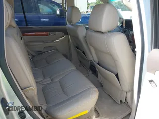 2003 Lexus GX with VIN JTJBT20X530002434, listed as a IAAI auction lot 42176772 with 140,226 mi miles. Bid and sale history available at carsss.com. Image 8.