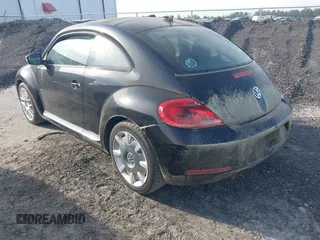 2013 Volkswagen Beetle 2.5L with VIN 3VWJP7AT1DM608370, listed as a IAAI auction lot 42088900 with Not Provided miles and . Bid and sale history available at DreamBid. Image 3.