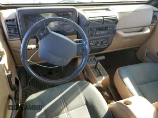 2001 Jeep Wrangler Sahara with VIN 1J4FA59S81P345126, listed as a Copart auction lot 88213245 with 152,211 mi miles and Salvage Title. Bid and sale history available at carsss.com. Image 8.