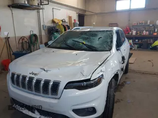 2020 Jeep Cherokee Altitude with VIN 1C4PJMLN6LD647106, listed as a IAAI auction lot 41406440 with 58,788 mi miles. Bid and sale history available at carsss.com. Image 6.
