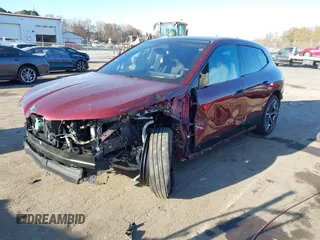 2024 BMW iX xDrive50 z VIN WB523CF01RCN36813, wystawiony jako IAAI lot #41029962 z przebiegiem 10 996 mil mil oraz . Historia ofert i sprzedaży dostępna na DreamBid. Obrazek 22.