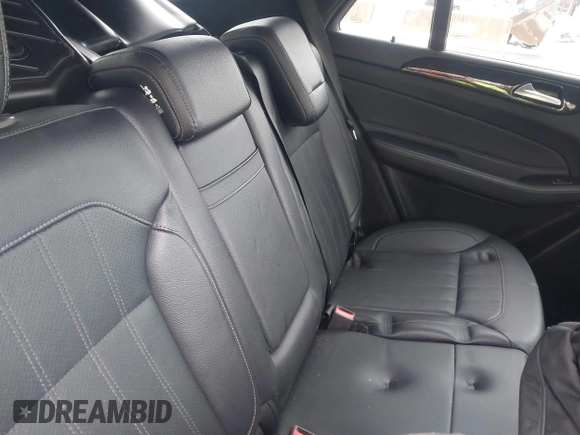 2018 Mercedes-Benz GLE 350 with VIN 4JGDA5HB2JB163672, listed as a IAAI auction lot 41560772 with 76,685 mi miles and . Bid and sale history available at DreamBid. Image 8.