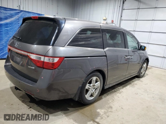 2013 Honda Odyssey Touring with VIN 5FNRL5H91DB024040, listed as a Copart auction lot 57241615 with 163,788 mi miles and Salvage title. Bid and sale history available at DreamBid. Image 3.
