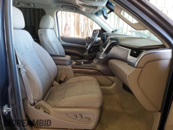 2015 Chevrolet Tahoe LS with VIN 1GNSCAKC5FR501801, listed as a Copart auction lot 50850645 with 112,896 mi miles and Salvage title. Bid and sale history available at DreamBid. Image 7.