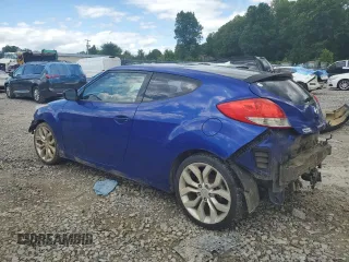 2013 Hyundai Veloster w/Gray Int with VIN KMHTC6AD5DU102803, listed as a Copart auction lot 58628935 with 129,616 mi miles and Salvage title. Bid and sale history available at DreamBid. Image 2.