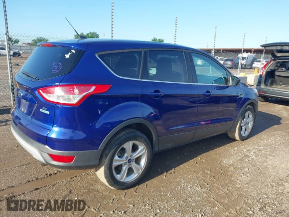 2014 Ford Escape SE with VIN 1FMCU0GX8EUA69910, listed as a IAAI auction lot 42174164 with 194,628 mi miles and . Bid and sale history available at DreamBid. Image 4.