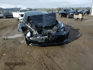 2023 Tesla Model 3 z VIN 5YJ3E1EA5PF695044, wystawiony jako Copart lot #45182665 z przebiegiem 21 104 mil mil oraz Szkoda całkowita • Salvage title. Historia ofert i sprzedaży dostępna na DreamBid. Obrazek 11.