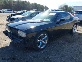 2012 Dodge Challenger SXT Plus with VIN 2C3CDYAG3CH196337, listed as a IAAI auction lot 41661921 with 162,490 mi miles. Bid and sale history available at carsss.com. Image 2.