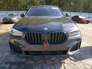 2023 BMW X6 xDrive40i z VIN 5UXCY6C04P9P46153, wystawiony jako Copart lot #81151634 z przebiegiem Nie podano mil oraz Szkoda całkowita • Salvage title. Historia ofert i sprzedaży dostępna na DreamBid. Obrazek 5.