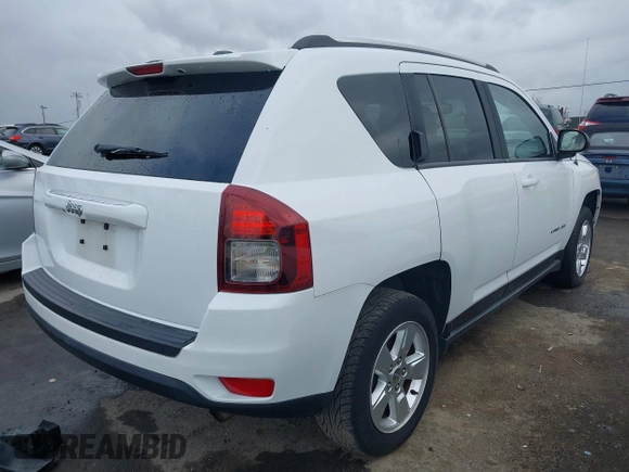 2014 Jeep Compass Altitude with VIN 1C4NJCBA8ED606589, listed as a IAAI auction lot 41939914 with 148,281 mi miles. Bid and sale history available at carsss.com. Image 4.
