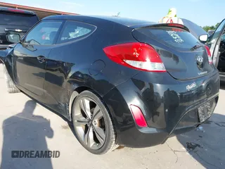2013 Hyundai Veloster w/Black Int with VIN KMHTC6AD2DU171044, listed as a IAAI auction lot 42245907 with 140,542 mi miles and . Bid and sale history available at DreamBid. Image 3.