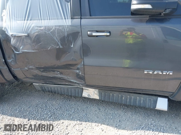 2019 Ram 1500 Big Horn/Lone Star with VIN 1C6RRFFG7KN817399, listed as a IAAI auction lot 40296231 with 63,708 mi miles. Bid and sale history available at carsss.com. Image 6.