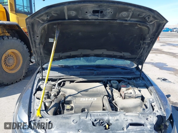 2013 Ford Taurus SHO с VIN 1FAHP2KT0DG220825, выставлен на аукционе IAAI как лот 41851095 с пробегом 163 797 миль миль и . История ставок и продаж доступна на DreamBid. Изображение 10.