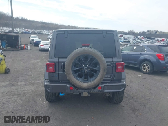 2021 Jeep Wrangler Unlimited Sahara with VIN 1C4JJXP65MW676726, listed as a IAAI auction lot 41795701 with 38,480 mi miles and . Bid and sale history available at DreamBid. Image 16.