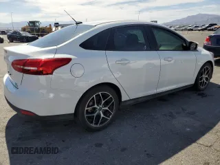 2018 Ford Focus SE with VIN 1FADP3FE4JL322857, listed as a Copart auction lot 58090025 with 58,148 mi miles and Clean title. Bid and sale history available at DreamBid. Image 3.