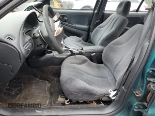 1997 Chevrolet Cavalier LS z VIN 1G1JF5244V7190036, wystawiony jako Copart lot #56882255 z przebiegiem 88 532 mil mil oraz Szkody całkowita. Historia ofert i sprzedaży dostępna na DreamBid. Obrazek 7.