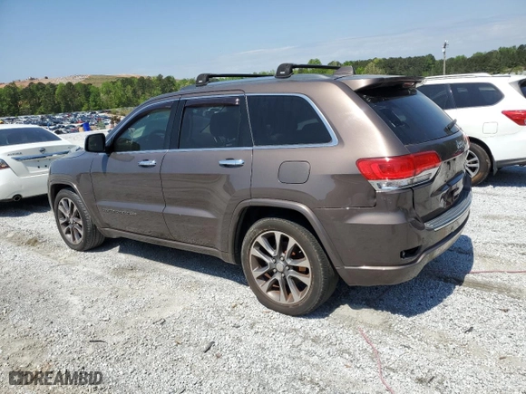 2017 Jeep Grand Cherokee Overland with VIN 1C4RJECG1HC868559, listed as a Copart auction lot 52569595 with 168,226 mi miles and Clean Title. Bid and sale history available at carsss.com. Image 2.