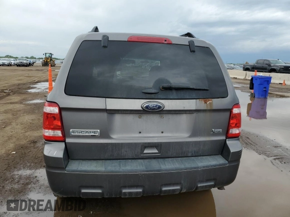 2012 Ford Escape XLT with VIN 1FMCU9DG6CKB43438, listed as a Copart auction lot 58499905 with 179,911 mi miles and Salvage title. Bid and sale history available at DreamBid. Image 6.