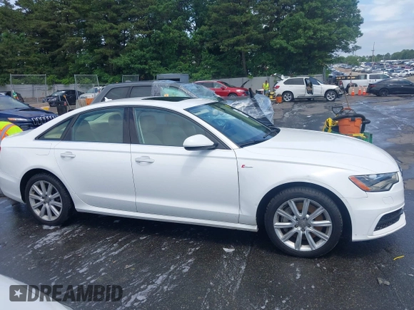 2014 Audi A6 Prestige with VIN WAUHGAFCXEN091050, listed as a IAAI auction lot 42524560 with 169,575 mi miles and . Bid and sale history available at DreamBid. Image 13.