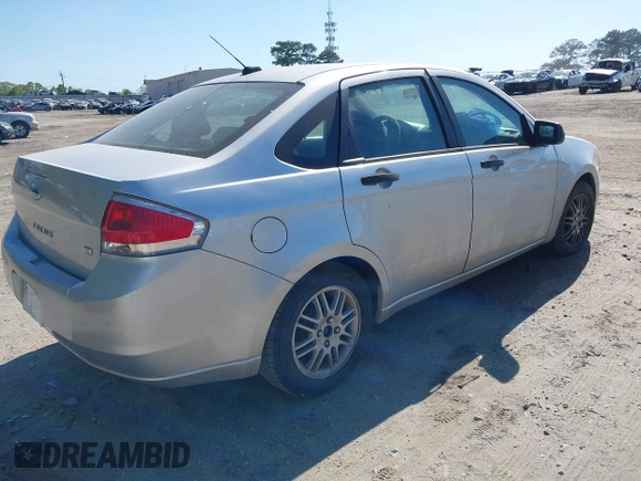 2011 Ford Focus SE with VIN 1FAHP3FN9BW132599, listed as a IAAI auction lot 42056339 with 212,846 mi miles and . Bid and sale history available at DreamBid. Image 4.
