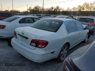 2003 Infiniti I35 Luxury z VIN JNKDA31A13T106515, wystawiony jako Copart lot #71875064 z przebiegiem Nie podano mil oraz Nie do naprawy • Non repairable. Historia ofert i sprzedaży dostępna na DreamBid. Obrazek 3.