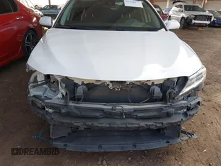2019 Toyota Camry LE with VIN 4T1B11HK0KU798847, listed as a IAAI auction lot 41944077 with 138,289 mi miles and . Bid and sale history available at DreamBid. Image 6.
