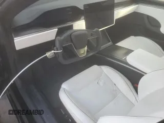 2022 Tesla Model S Plaid z VIN 5YJSA1E64NF461218, wystawiony jako Copart lot #84467644 z przebiegiem Nie podano mil oraz Szkoda całkowita • Salvage title. Historia ofert i sprzedaży dostępna na DreamBid. Obrazek 8.