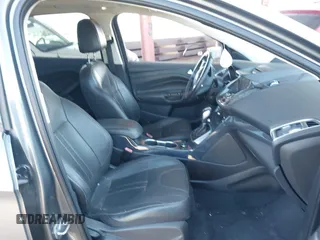 2013 Ford Escape Titanium with VIN 1FMCU0J95DUA29390, listed as a IAAI auction lot 42720269 with 147,413 mi miles and . Bid and sale history available at DreamBid. Image 5.