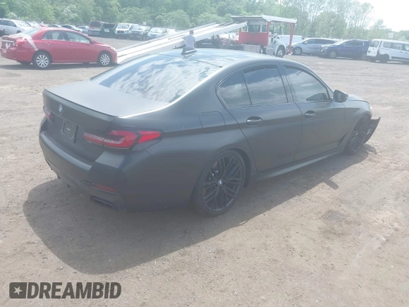 2023 BMW 5 Series M550i xDrive with VIN WBA13BK02PCN47443, listed as a IAAI auction lot 42290388 with Not provided miles and . Bid and sale history available at DreamBid. Image 4.