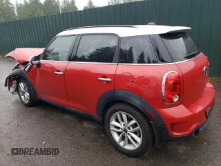 2014 MINI Countryman S with VIN WMWZC3C52EWP25379, listed as a Copart auction lot 61438355 with 76,943 mi miles and Salvage title. Bid and sale history available at DreamBid. Image 2.