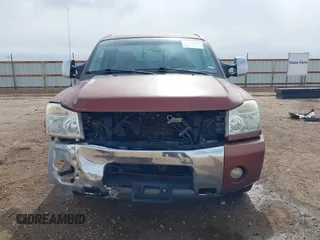 2004 Nissan Titan XE with VIN 1N6AA06A04N508069, listed as a IAAI auction lot 41571931 with 180,119 mi miles. Bid and sale history available at carsss.com. Image 13.