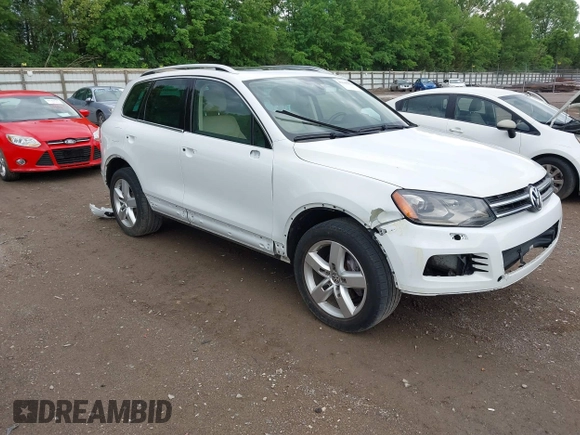 2013 Volkswagen Touareg Exec z VIN WVGEF9BP5DD005322, wystawiony jako IAAI lot #42146276 z przebiegiem 154 498 mil mil oraz . Historia ofert i sprzedaży dostępna na DreamBid. Obrazek 1.