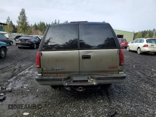 1999 GMC Suburban with VIN 3GKFK16RXXG541485, listed as a Copart auction lot 49271315 with 238,043 mi miles and Clean Title. Bid and sale history available at carsss.com. Image 6.
