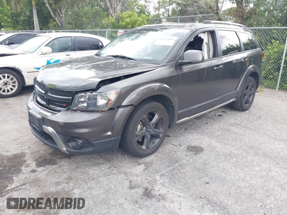 2020 Dodge Journey Crossroad with VIN 3C4PDCGB0LT270042, listed as a IAAI auction lot 40521806 with 102,934 mi miles and . Bid and sale history available at carsss.com. Image 2.