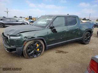 2023 Rivian R1T Adventure with VIN 7FCTGAAA2PN018657, listed as a Copart auction lot 75889434 with 14,342 mi miles and Salvage Title. Bid and sale history available at carsss.com. Image 1.