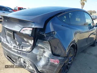2023 Tesla Model Y Performance with VIN 7SAYGDEF5PF823122, listed as a IAAI auction lot 41546480 with 12,943 mi miles and . Bid and sale history available at DreamBid. Image 6.